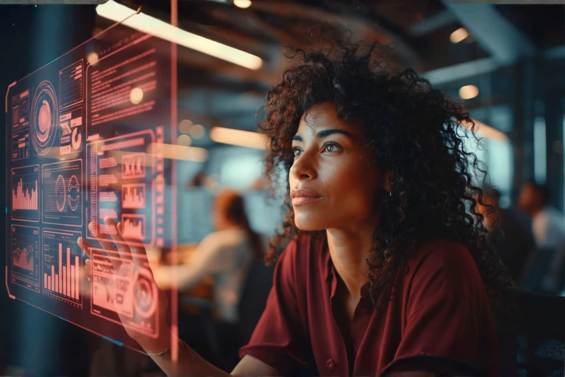 Mulher na tecnologia analisando dados em um ambiente futurista, representando avanços e oportunidades para mulheres na tecnologia.