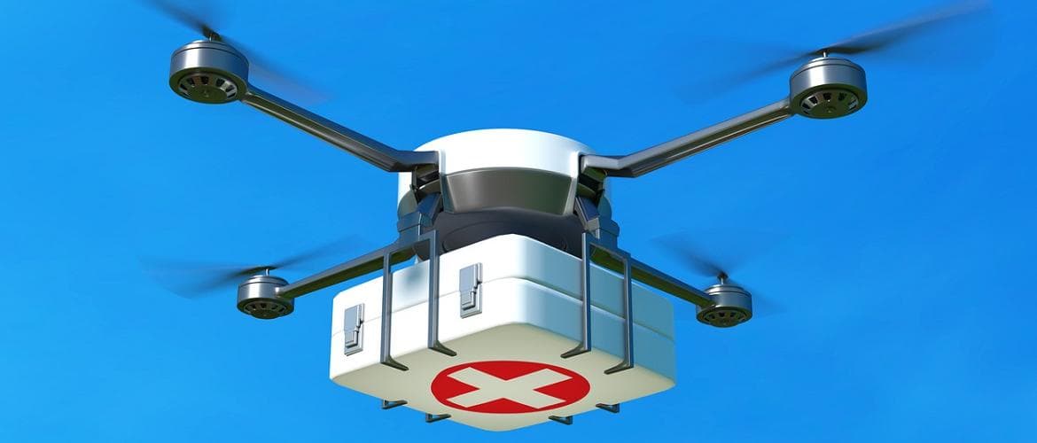 Imagem de um drone transportando um kit médico