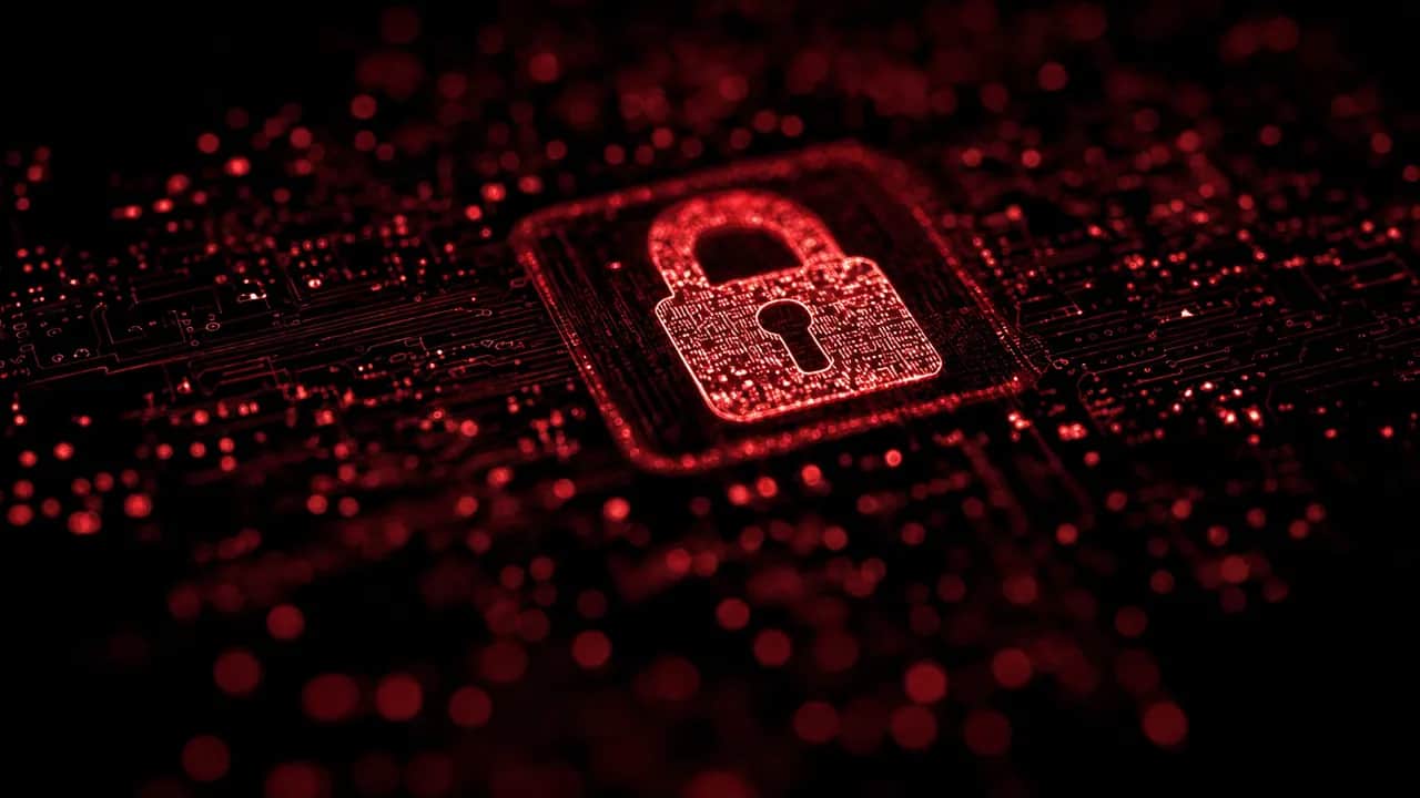 ícone de cadeado digital em destaque com circuitos e pontos luminosos em tons de vermelho, simbolizando cibersegurança, proteção e segurança de dados